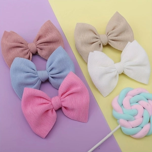 Cinco diademas elásticas con lazos grandes en colores pastel suaves para bebés