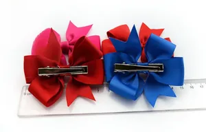 Detailed view of handmade solid color ribbed ribbon hair bow clips with 8cm size reference