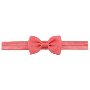 Coral pink baby headband with a ribbed bow on a high elasticity stretchy soft band