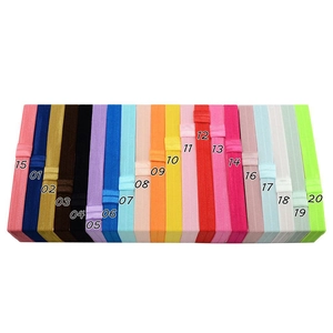 Detailed flat lay of 20 vibrant colors of 1.5cm elastic headbands for children