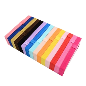Set of 14 colorful 1.5cm elastic headbands for children on white display board