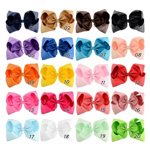 Detailed color chart showing 20 colorful 8-inch grosgrain ribbon bow hair clips for girls