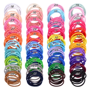 Detailed grid view of 40 color sets showing high-elastic seamless hair ties for girls