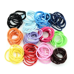 Detail view of 12 vibrant colors high elasticity hair ties set for kids and DIY accessories