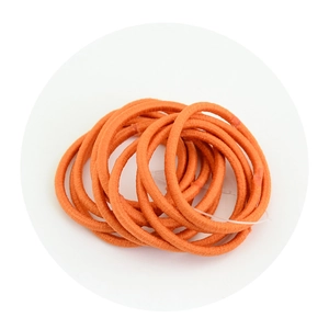 Close-up of bright orange high-elasticity braided hair ties showing textured fabric material