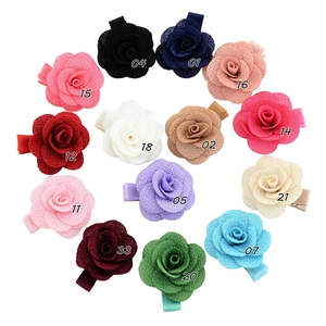 Set of 14 colorful camellia flower hair clips in various wool fabric shades