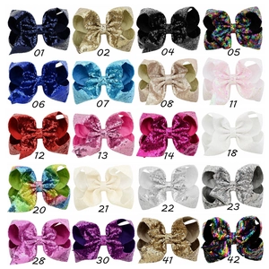 Macro display of 20 colors for the 8-inch sequin hair bow collection for girls