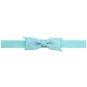 Detail of light blue grosgrain ribbon bow headband with elastic strap for baby girls