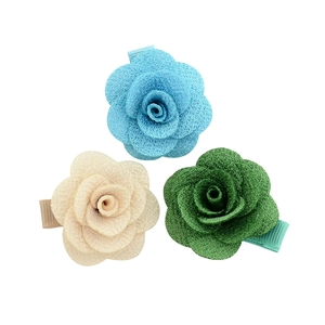 Three-piece set of camellia fabric flower hair clips in blue, white, and green tones