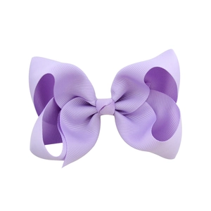 Fermaglio per capelli con fiocco in nastro grosgrain viola chiaro e trama a costine per bambine