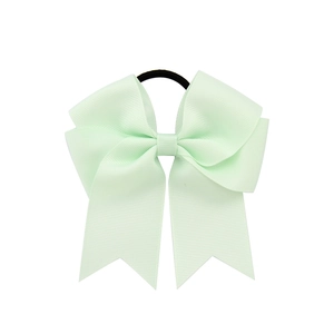 Mint green grosgrain ribbon bow hair tie with a durable black elastic band for kids
