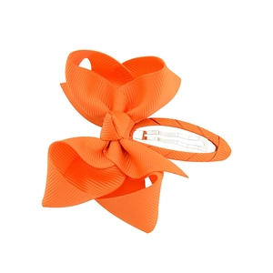 Vibrant orange grosgrain ribbon bow hair clip for girls with fabric covered BB snap base