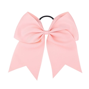 Detail of 8-inch pink grosgrain ribbon bow hair tie with elastic band for kids