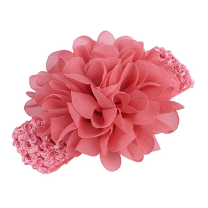 Elastic baby headband with a vibrant pink layered chiffon flower on a soft crochet band