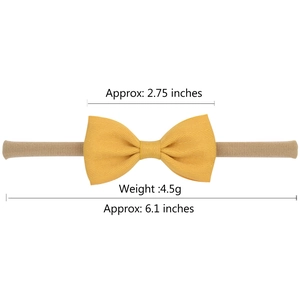 Bandeau élastique doux pour bébé avec nœud en gros-grain jaune de 6,1 pouces sur fond blanc