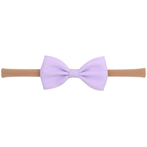 Bandeau bébé avec nœud en tissu lilas clair et bande en nylon souple extensible