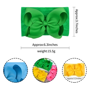 Elastic baby nylon headband with large 6.3-inch ribbed bow in vibrant green color