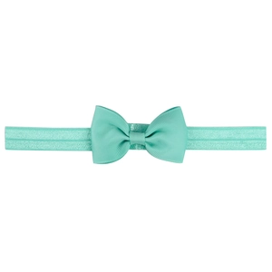 Detail of mint green bow headband made of ribbed fabric with soft elastic band for babies