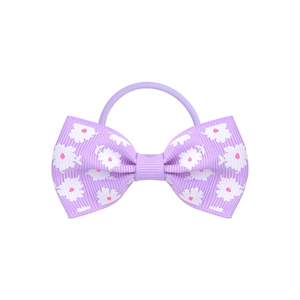 Nœud papillon violet à motif floral avec élastique à cheveux pour petite fille