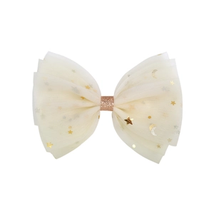 Detail of off-white layered mesh bow clip with golden stars and rose gold center