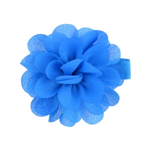 Detailed close-up of a blue chiffon flower hair clip with a ribbon-wrapped metal base