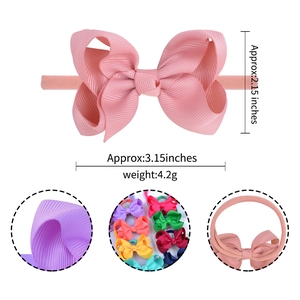 Pink grosgrain ribbon bow headband for babies with various colorful elastic bands