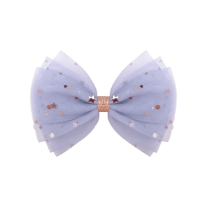 Detail of lavender chiffon bow hair clip with gold star sequins and mesh layers