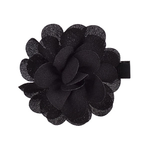 Detail view of handmade black chiffon flower hair clip with a ribbon-wrapped base