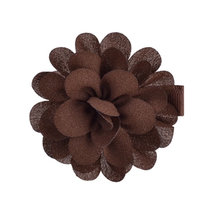 Close-up of brown chiffon flower hair clip showing detailed layered fabric petals