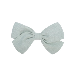 Pale mint green cotton linen bow hair clip for girls with fine mesh texture finish