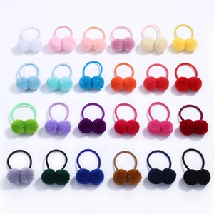 Set of 24 colorful faux fur pom pom hair ties with elastic bands for girls