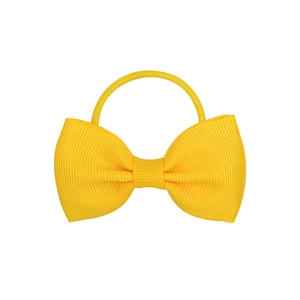 Detail of bright yellow grosgrain ribbon bow hair tie with elastic band for girls