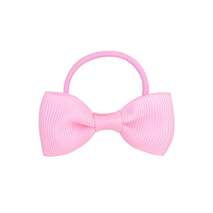 Detail view of the pink ribbed ribbon bow hair tie with high-elasticity rubber band