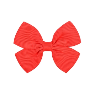 Vibrant red grosgrain ribbon bow hair clip for girls with ribbed texture and classic design