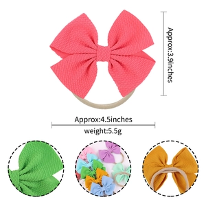 Knitted nylon bow headband for infants in coral pink, green, and yellow multi-set