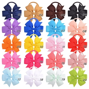 Detailed 4x5 grid view of 20 vibrant colors of ribbed grosgrain ribbon bow hair ties