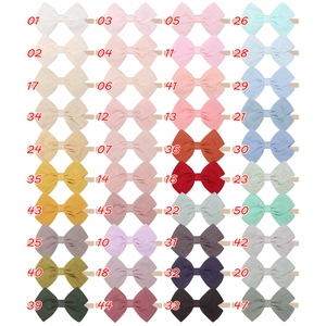 Collection of 40 colors of cotton linen bow headbands with soft nylon elastic straps