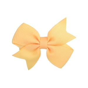 Classic peach solid color ribbon bow hair clip with ribbed texture for girls