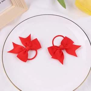 Lot de deux élastiques à cheveux rouges avec nœuds en ruban gros-grain pour filles