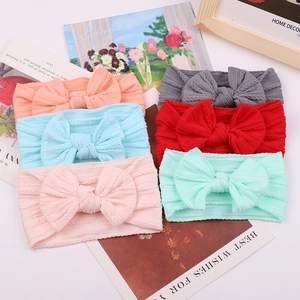 Pack of 6 soft knitted nylon baby headbands with jacquard bow in various candy colors