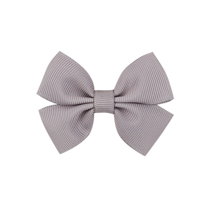 Close-up of lilac grosgrain ribbon hair bow showing horizontal ribbed texture