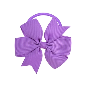 Detail of purple grosgrain ribbon bow hair tie for girls with durable elastic band