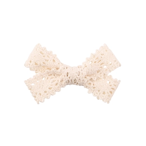 Elegant cream white lace bow hair clip for girls with vintage textured woven floral patterns