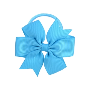 Detail of light blue grosgrain ribbon bow hair tie with textured layered design
