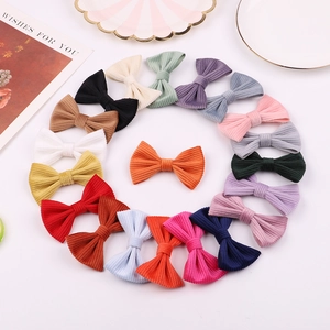 Set of 20 colorful corduroy bow hair clips for girls in various Morandi shades