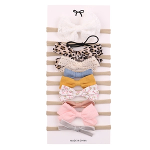 10-piece baby bow headband set with elastic nylon bands in floral and lace styles