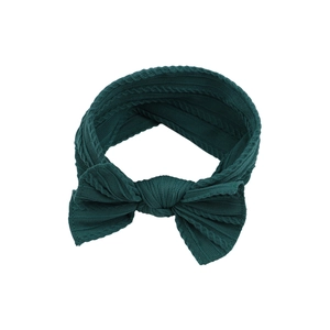 Deep forest green jacquard knitted baby headband with oversized ribbed bow detail