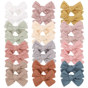 Handmade set of 24 children's embroidery fabric hair bows in assorted colors for girls