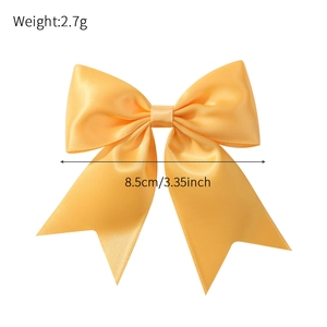 Golden satin bow hair clip for girls with a 3.35 inch floral ribbon and metal hairpins