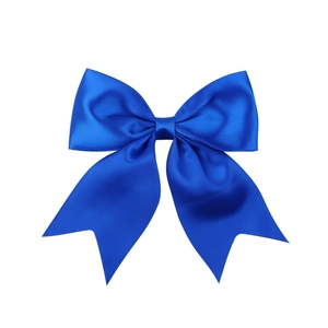 Close-up of a high-gloss dark blue satin fabric hair bow with elegant swallowtail ribbons